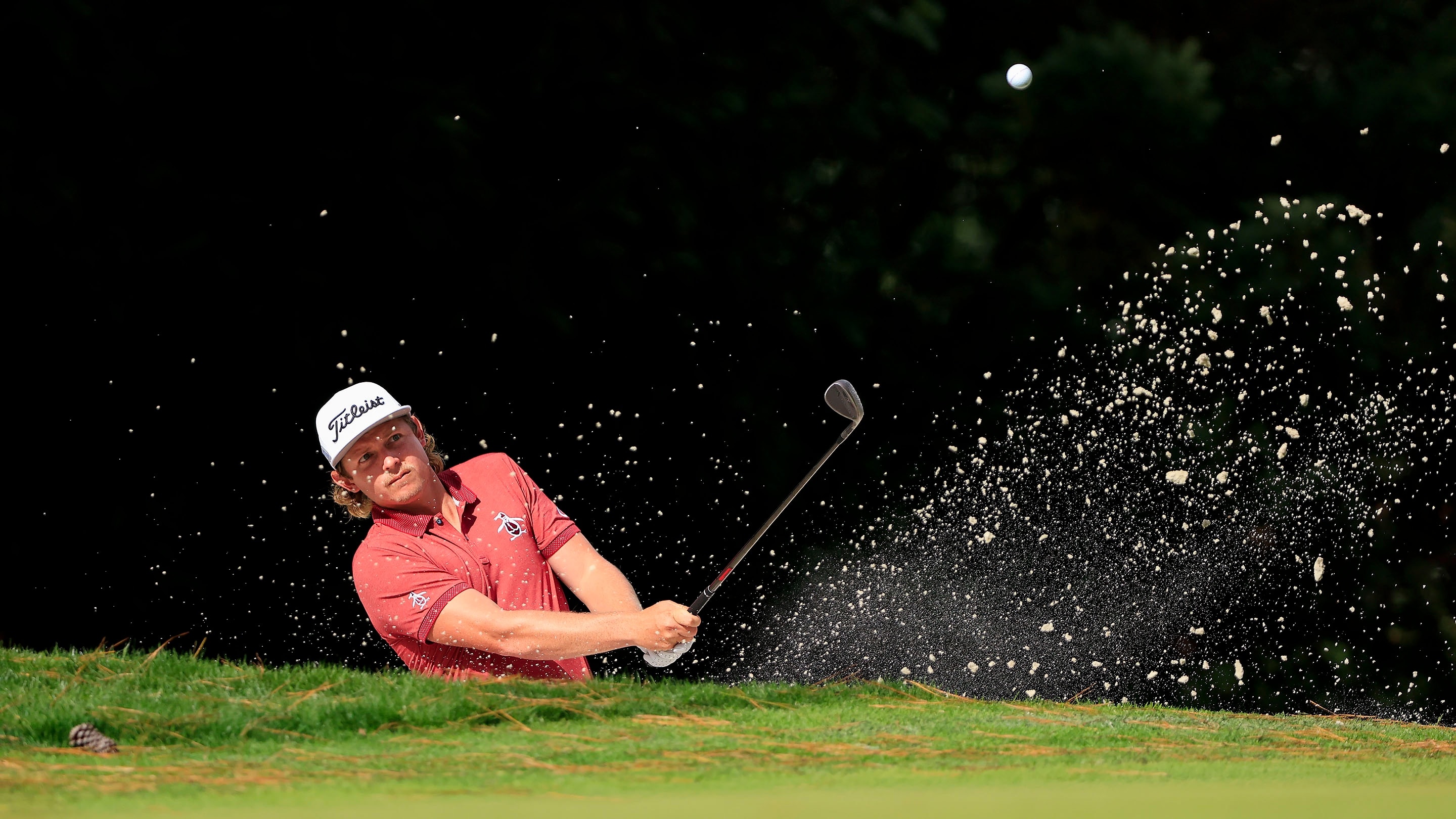 Cameron Smith of Australia plays a stroke from a bunker on the No. 10