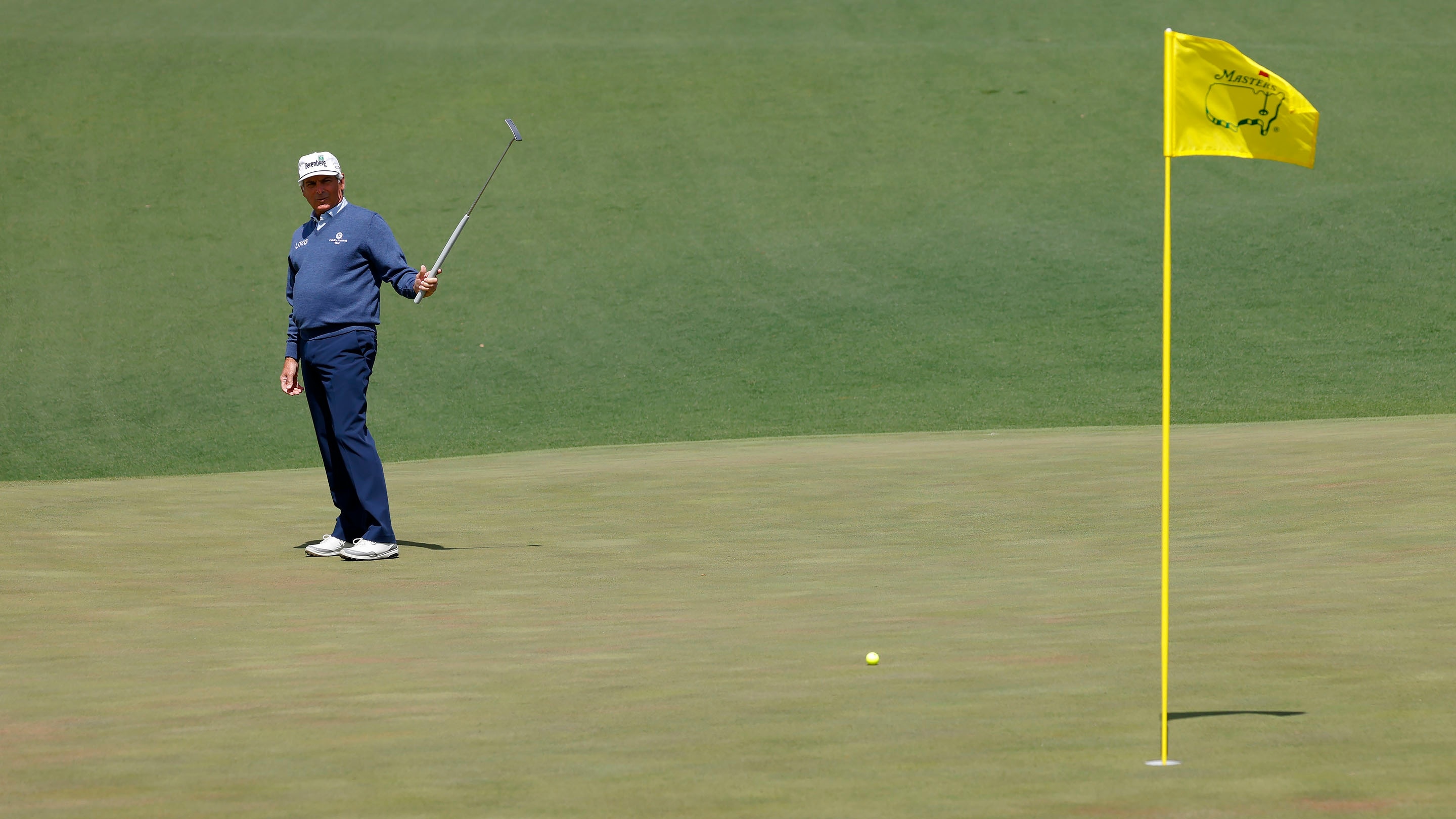 Masters champion fred couples putts at no 2 during the second round of